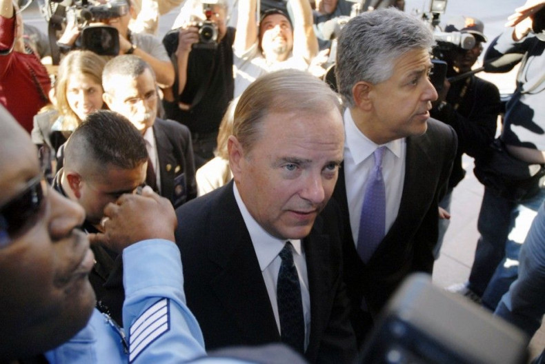 Jeff Skilling, former Enron CEO, and attorney Daniel Petrocelli are escorted by federal marshals, away from Houston Federal court