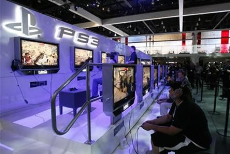 Visitors play the Sony video game MAG for PlayStation 3 during the Electronic Entertainment Expo or E3 in Los Angeles