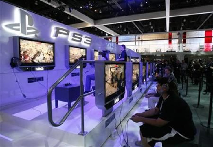 Visitors play the Sony video game MAG for PlayStation 3 during the Electronic Entertainment Expo or E3 in Los Angeles