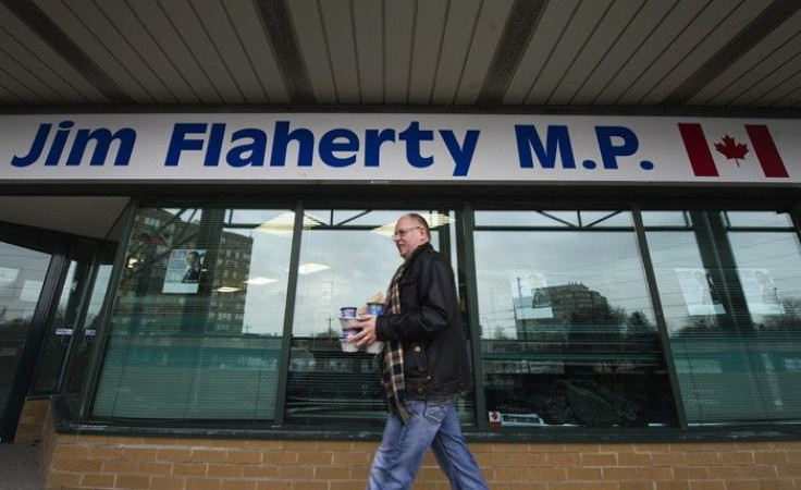 Sid Ryan, president of the Ontario Federation of Labour, brings coffee to union members occupying Finance Minister Jim Flaherty's office in Whitby