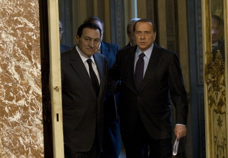 Italian Prime Minister Silvio Berlusconi (R)and Egyptian President Hosni Mubarak arrive during a meeting at Chigi Palace in Rome September 23, 2010