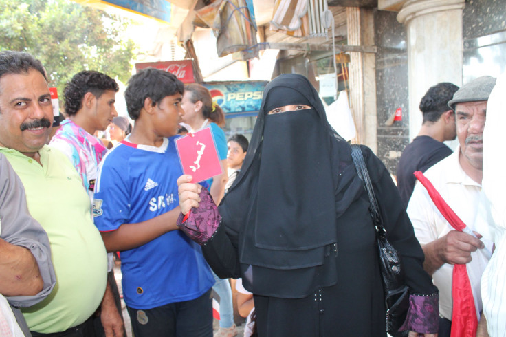 Woman protester in niqab