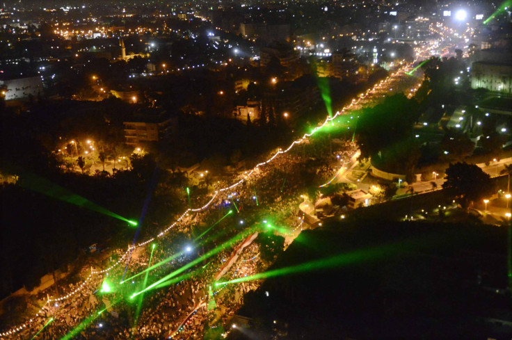 Anti-Morsi rally in Cairo Egypt lit by lasers