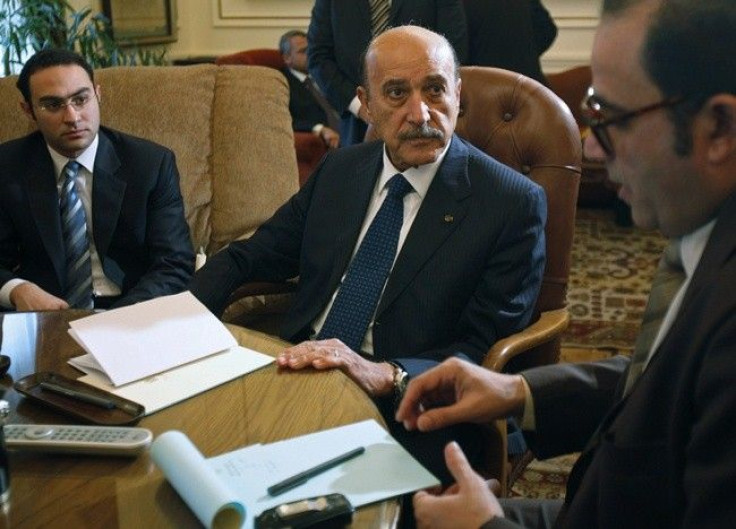Egyptian Vice President Omar Suleiman talks to representatives from political parties in the Prime Minister's office in Cairo February 6, 2011. Suleiman held talks on Sunday with opposition groups including the officially banned Muslim Brotherhood to try 