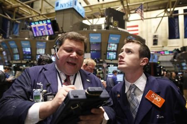 Traders work on the floor of the New York Stock Exchange