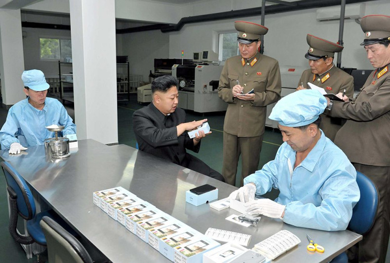 Kim Inspects North Korea Smartphone