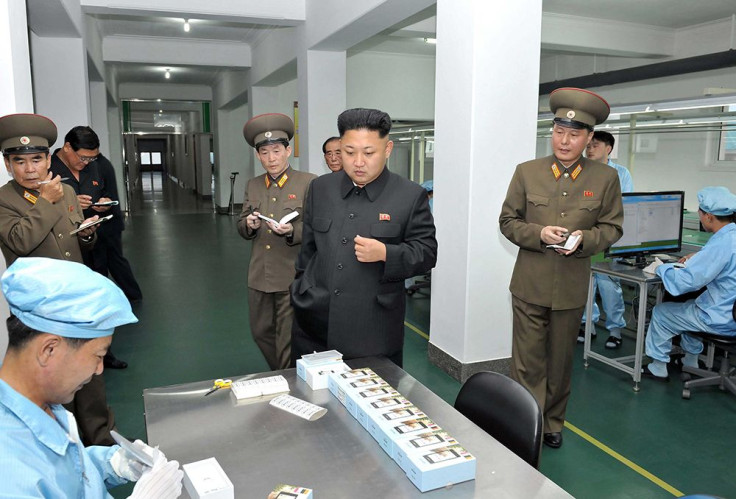 Kim Inspects North Korea Smartphone
