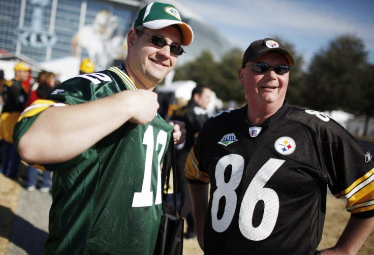 Packers fan faces off with a Steelers fan outside the stadium before the NFL's Super Bowl XLV football game in Arlington