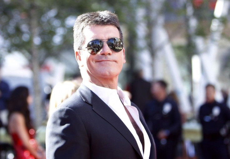 Judge Simon Cowell arrives for the 9th season finale of 'American Idol' in Los Angeles
