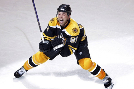 Bruins center Savard celebrates after scoring the game winning goal against the Flyers during the first overtime period in Game 1 of their NHL Eastern Conference semi-final hockey game in Boston.