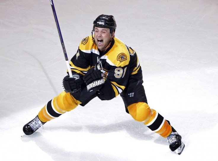 Bruins center Savard celebrates after scoring the game winning goal against the Flyers during the first overtime period in Game 1 of their NHL Eastern Conference semi-final hockey game in Boston.