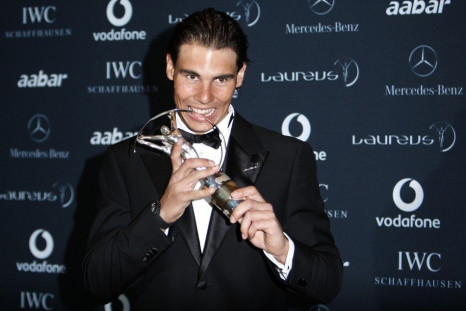 Tennis champion Nadal poses with his Laureus World Sportsman of the Year Award at Emirates Palace in Abu Dhabi.