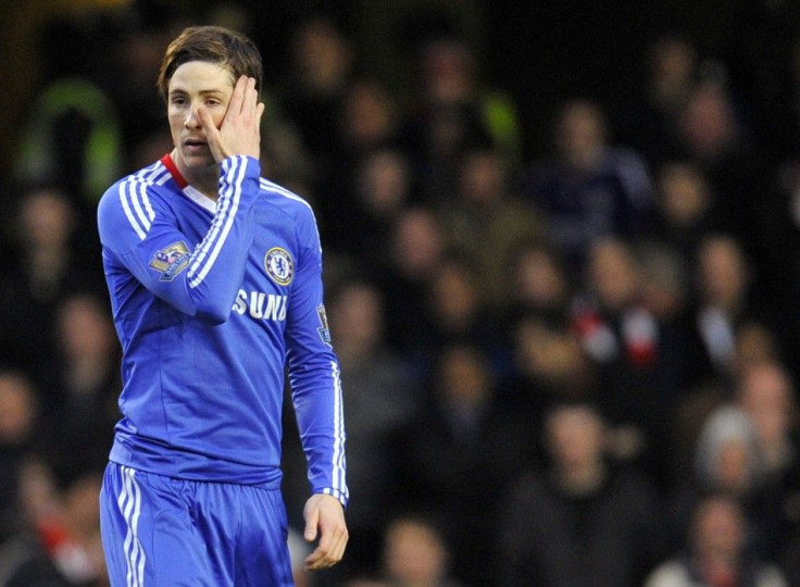 Chelsea's Torres reacts during their English Premier League soccer match against Liverpool at Stamford Bridge in London.