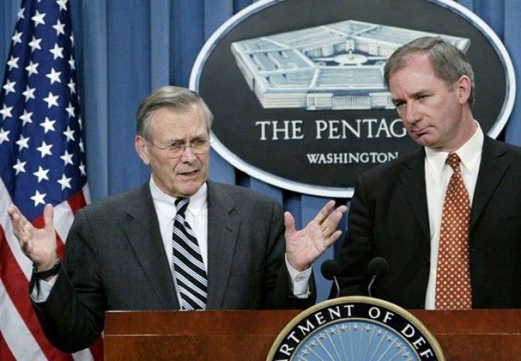 U.S. Secretary of Defense Donald Rumsfeld (L) holds a press conference with British Defense Minister Geoff Hoon (R) at the Pentagon February 12, 2003.