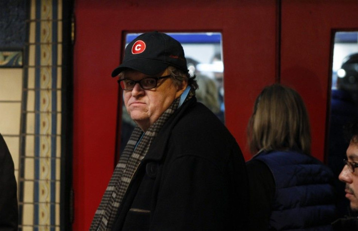 Director Moore walks into a theater during the Sundance Film Festival in Park City, Utah