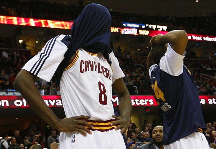 Cleveland Cavaliers' Christian Eyenga (L) and Samardo Samuels react during the fourth quarter of their NBA basketball game against the Portland Trail Blazers in Cleveland February 5, 2011. The Cavaliers lost their 24th consecutive game to set an NBA recor