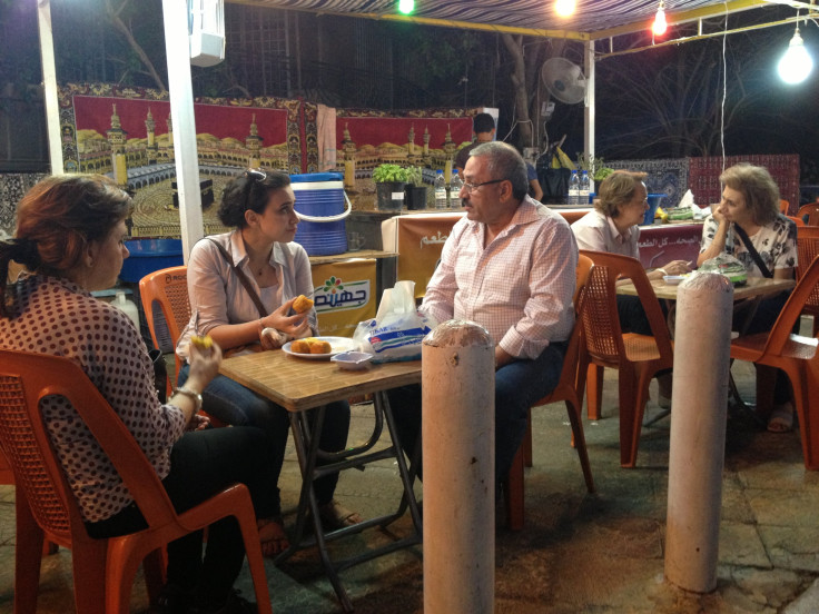 Family eating cactus fruit