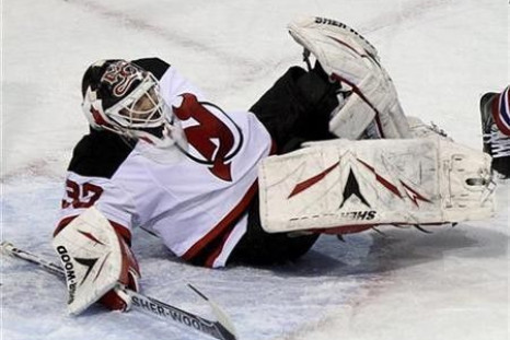 New Jersey Devils goalie Martin Brodeur (30) is injured during first period NHL hockey action against the Montreal Canadiens in Montreal, February 6, 2011. 