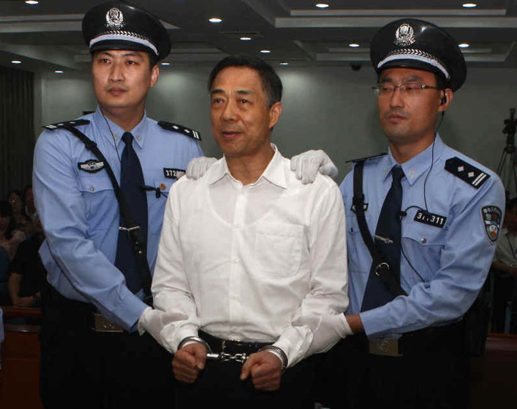 Bo Xilai in handcuffs