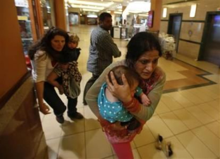 Indian woman holds her baby during attack at Westgate mall