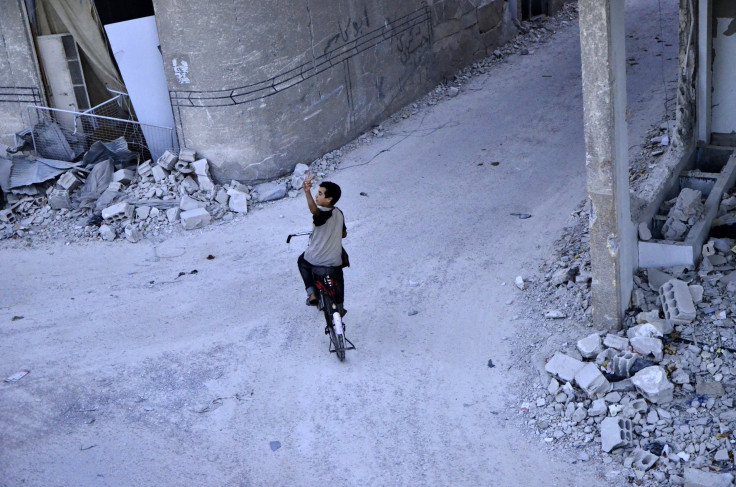 Boy on bike in Syria