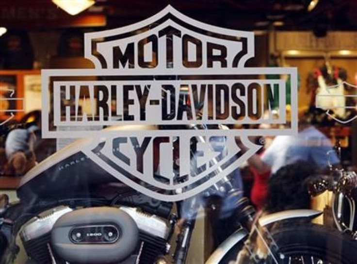 Motorcycle maker Harley Davidson's logo appears on the window of a store in Boston