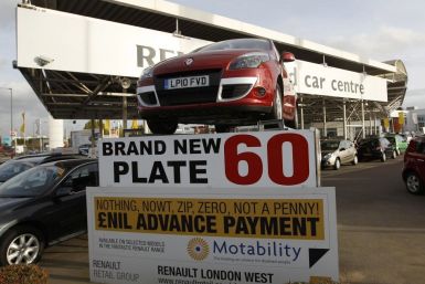 New cars are displayed for sale on the forecourt of a car showroom, in London November 4, 2010. 