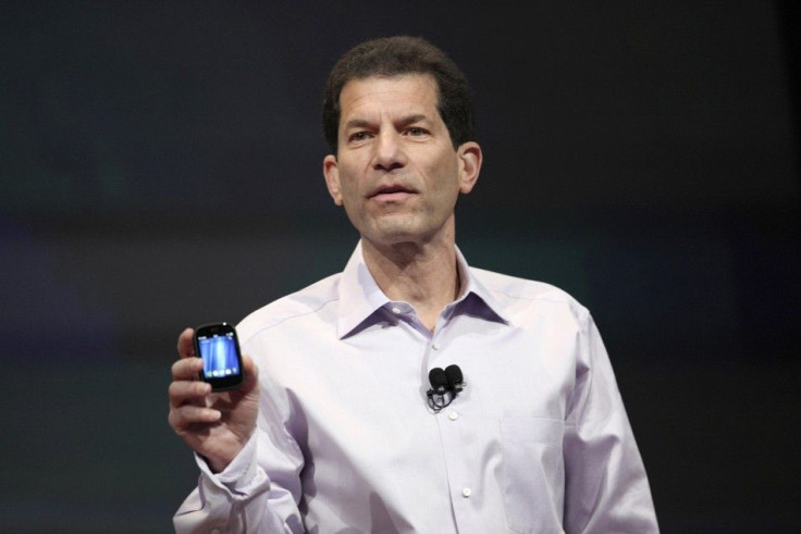 Jon Rubinstein, senior vice president and general manager for Palm, holds the HP Veer phone during a media presentation in San Francisco.