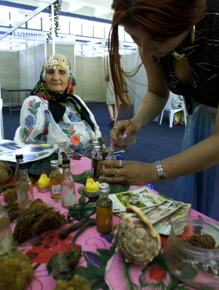 ROMANIAN GYPSY WITCHES FORTUNE TELLERS AT A FAIR IN BUCHAREST.