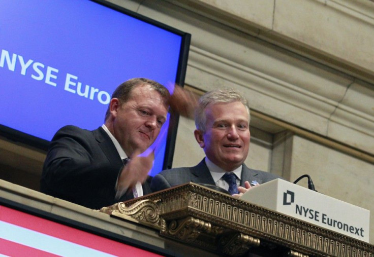 Prime Minister of Denmark Lars Rasmussen bangs the gavel with NYSE Euronext CEO Duncan Niederauer at the New York Stock Exchange