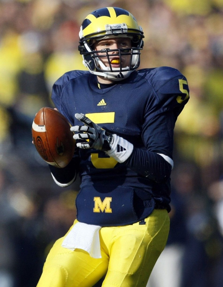 University of Michigan quarterback Tate Forcier looks for his receiver during the second half of their NCAA football game against Ohio State in Ann Arbor, November 21, 2009.