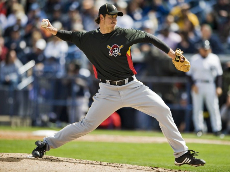 Pittsburgh Pirates' Ross Ohlendorf pitches against the New York Yankees during the third inning of a spring training baseball game.