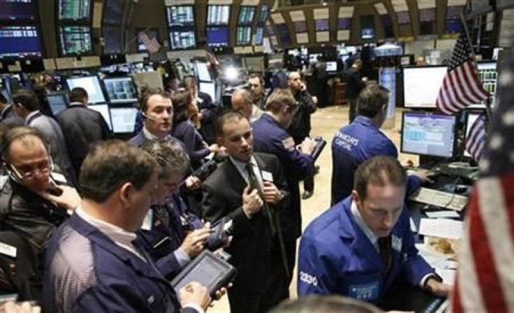 Traders work on the floor of the New York Stock Exchange