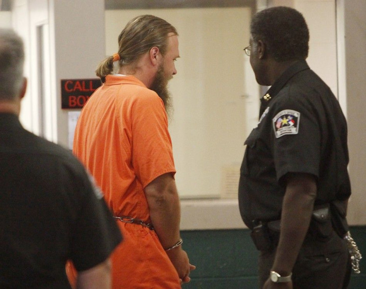 Daniel Patrick Boyd is escorted into the Wake County Public Safety Center after appearing at a detention hearing at the Terry Sanford Federal Building and Courthouse in Raleigh North Carolina August 4, 2009. 