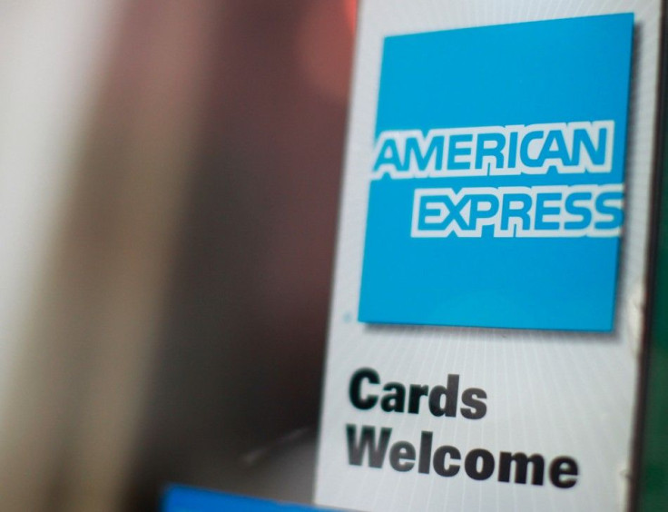 An American Express sign is seen on a restaurant door in New York