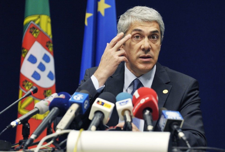 Portugal's PM Socrates holds during a EU leaders summit in Brussels