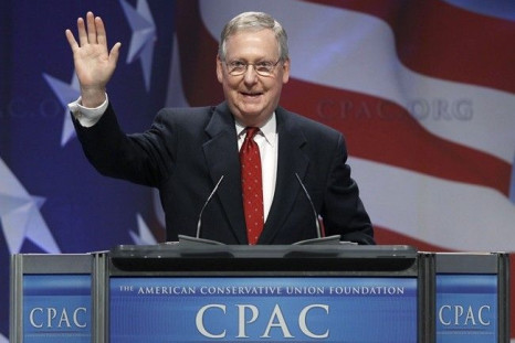 U.S. Senate Republican leader Mitch McConnell (R-KY) waves at the 38th annual Conservative Political Action Conference (CPAC) meeting at the Marriott Wardman Park Hotel in Washington, February 10, 2011.
