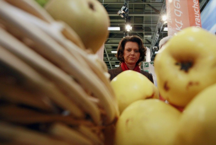 German Agriculture Minister Aigner looks at fruit and vegetables as she visits Internationale Gruene Woche IGW fair in Berlin