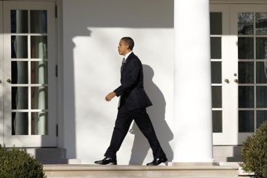 U.S. President Barack Obama walks to the Oval Office of the White House in Washington February 10, 2011. 