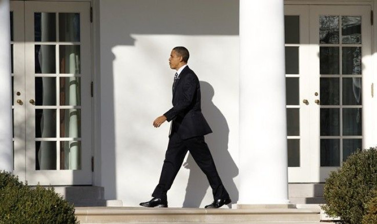 U.S. President Barack Obama walks to the Oval Office of the White House in Washington February 10, 2011. 