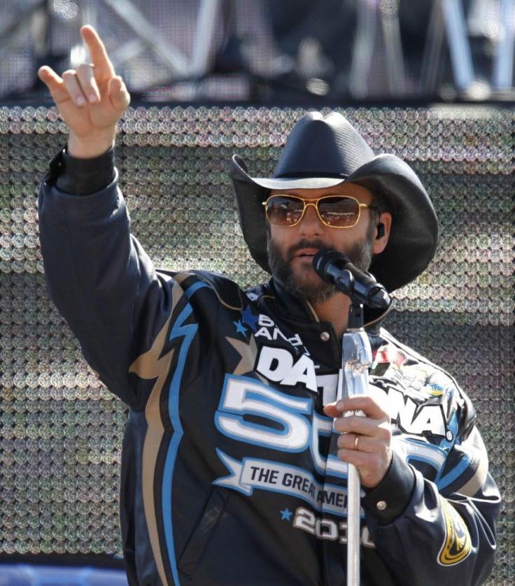 Country music singer Tim McGraw performs before the start of the NASCAR Sprint Cup Series Daytona 500 race at the Daytona International Speedway in Daytona Beach, Florida, February 14, 2010.