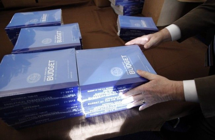 Copies of U.S. President Barack Obama's 2012 budget are unveiled on Capitol Hill in Washington, February 14, 2011. President Barack Obama proposed a budget on Monday that would cut the U.S. deficit by $1.1 trillion over 10 years, setting the stage for a b