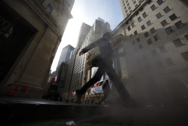 A man walks near the NYSE in New York