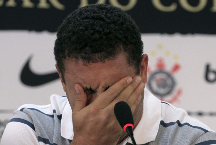 Ronaldo is overwhelmed with emotion while announcing his retirement from football at a press conference in Sao Paulo.
