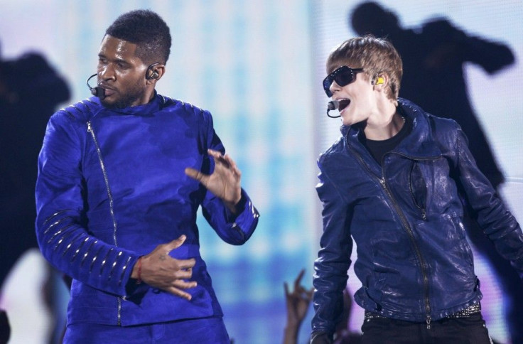 Canadian singer Justin Bieber and Usher perform &quot;OMG&quot; at the 53rd annual Grammy Awards in Los Angeles