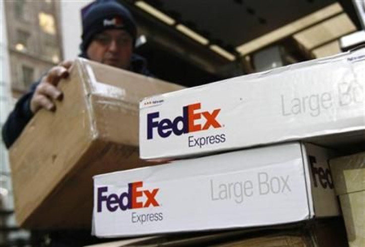 FedEx boxes unloaded off delivery truck in New York after FedEx Corp. reported quarterly profit and revenue data that missed Wall Street estimates