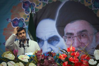 Iranian President Mahmoud Ahmadinejad takes part in a rally to mark the 32nd anniversary of the Islamic Revolution in Tehran February 11, 2011. 