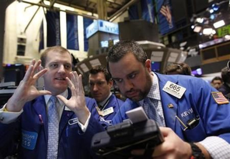 Traders work on the floor of the New York Stock Exchange