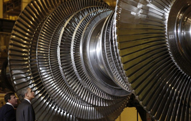 U.S. President Barack Obama views a turbine as he tours General Electric's birthplace in Schenectady, New York, January 21, 2011. 