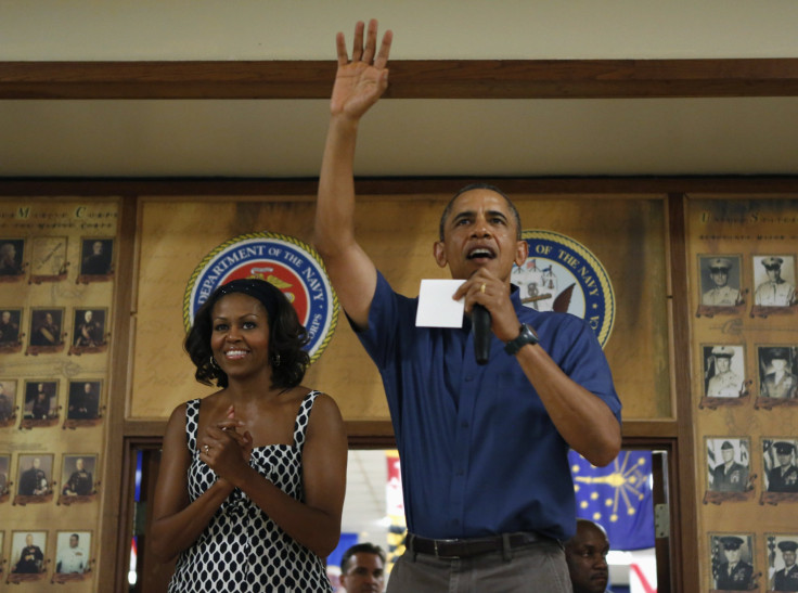 U.S. President Barack Obama (R) and first lady Michelle Obama 